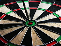 An image of a dartboard with a bullseye